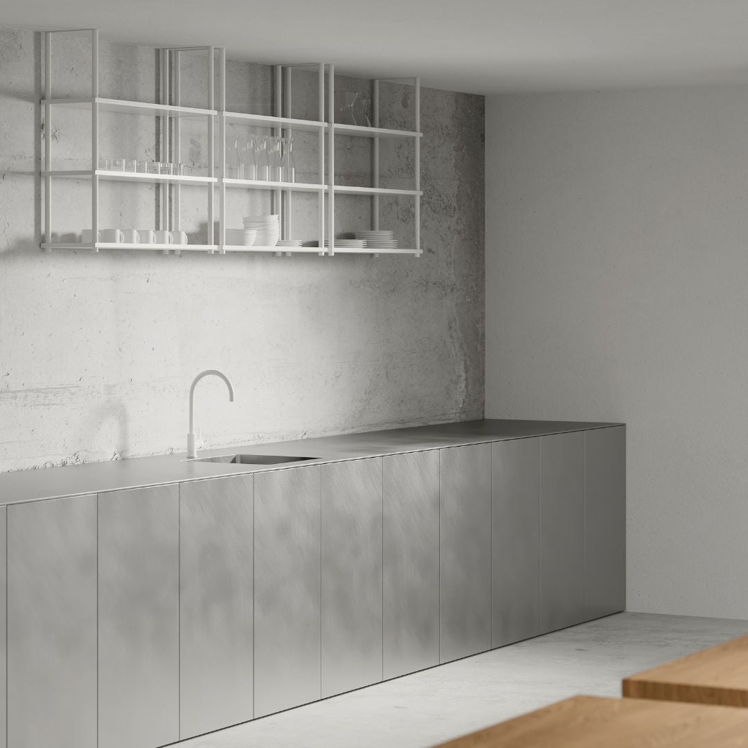 empty ceiling mounted shelves above a countertop and a sink
