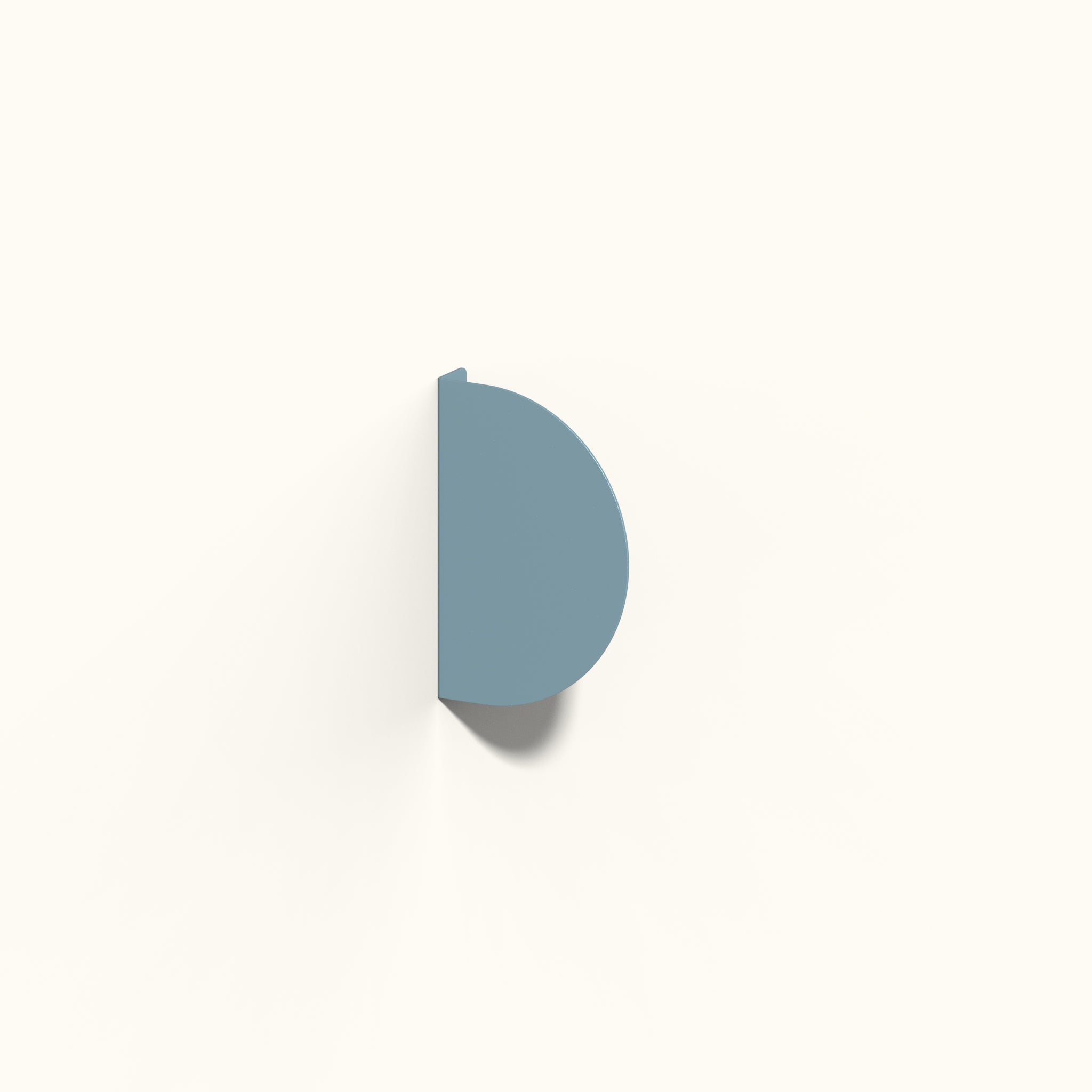 blue half round blade sign in studio