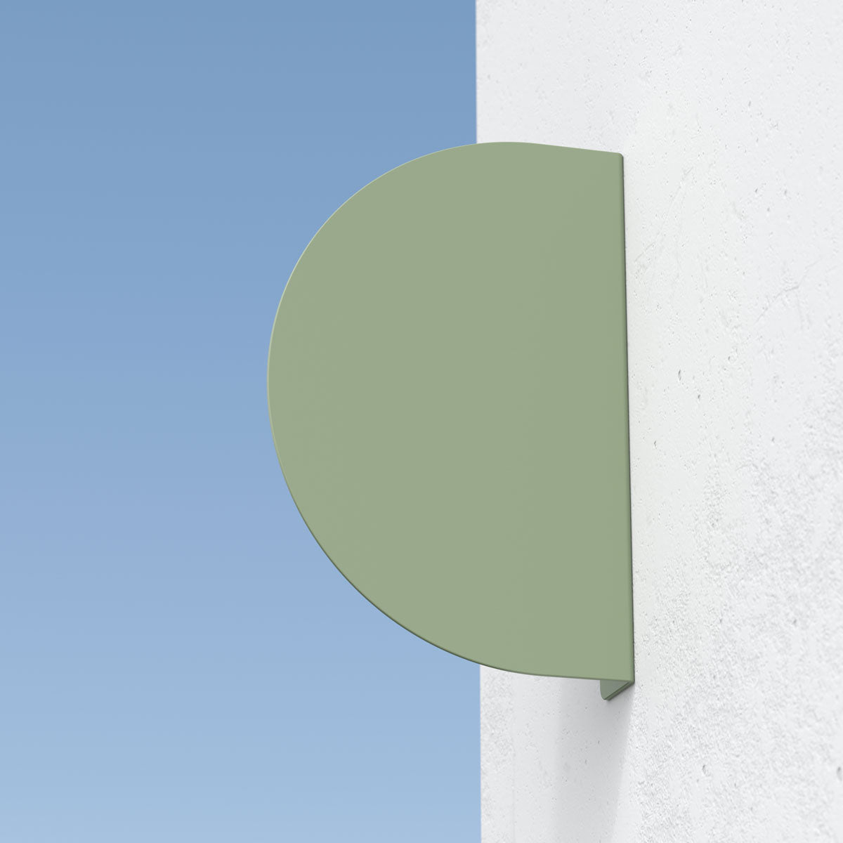 green half round blade sign installed outside