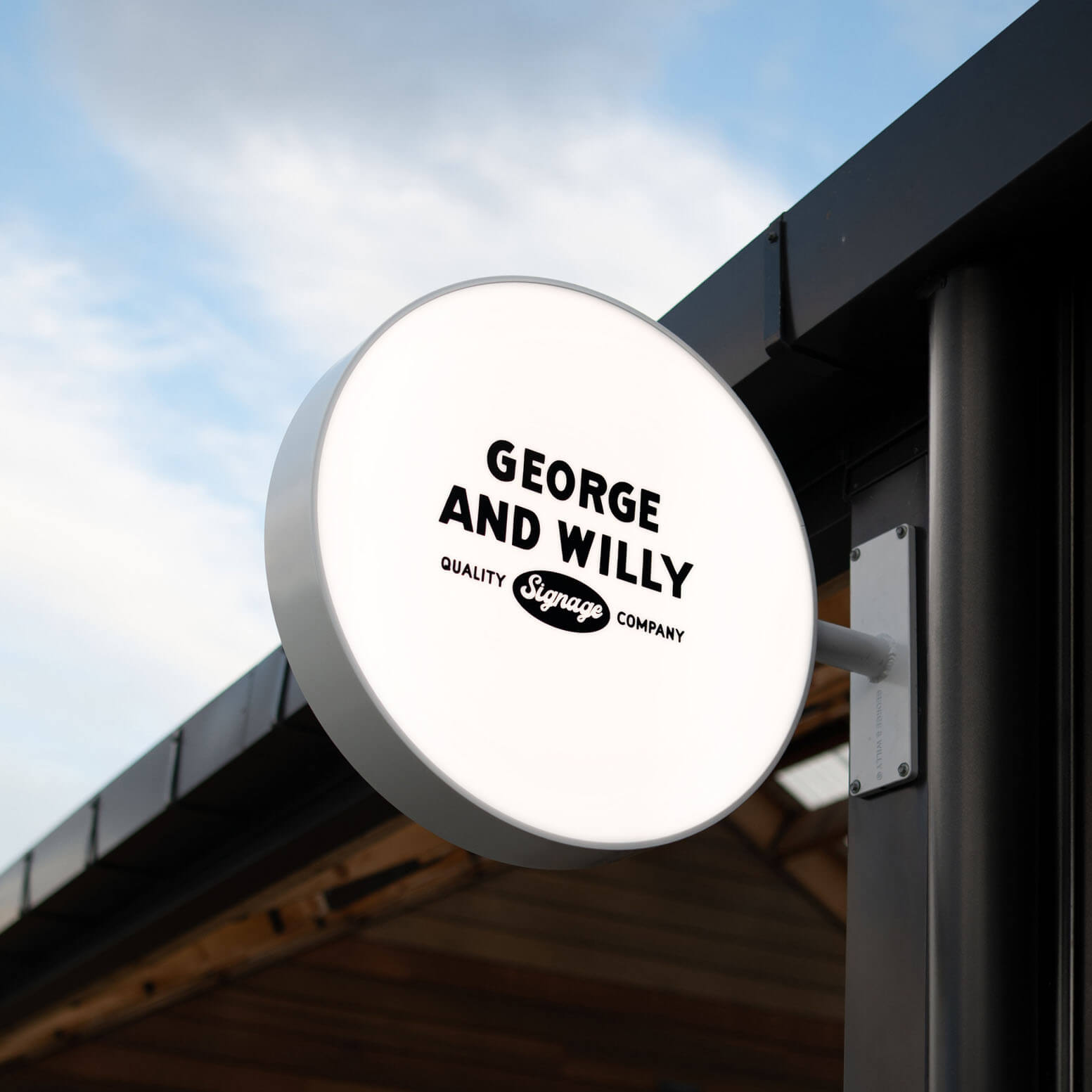 white round light box wall signage installed on a beam with george & willy branding