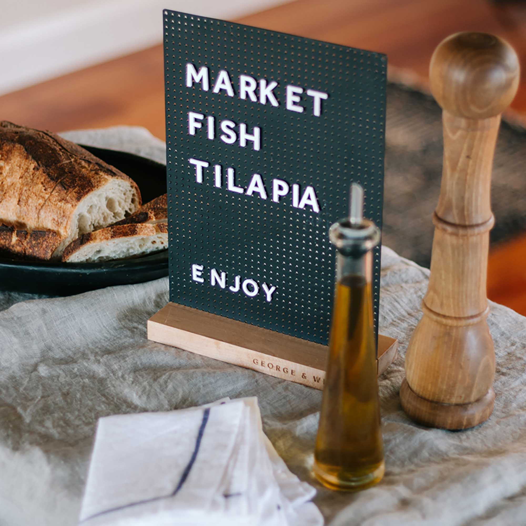 the mini peg letter board as a specials menu on a table of food displaying daily specials