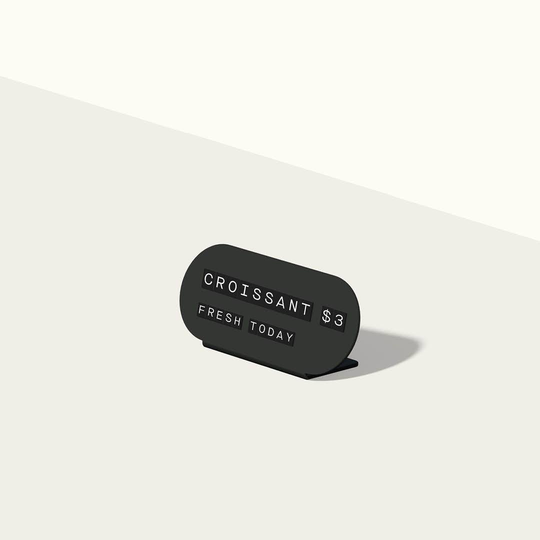 render of black curve pill-shaped counter display sign