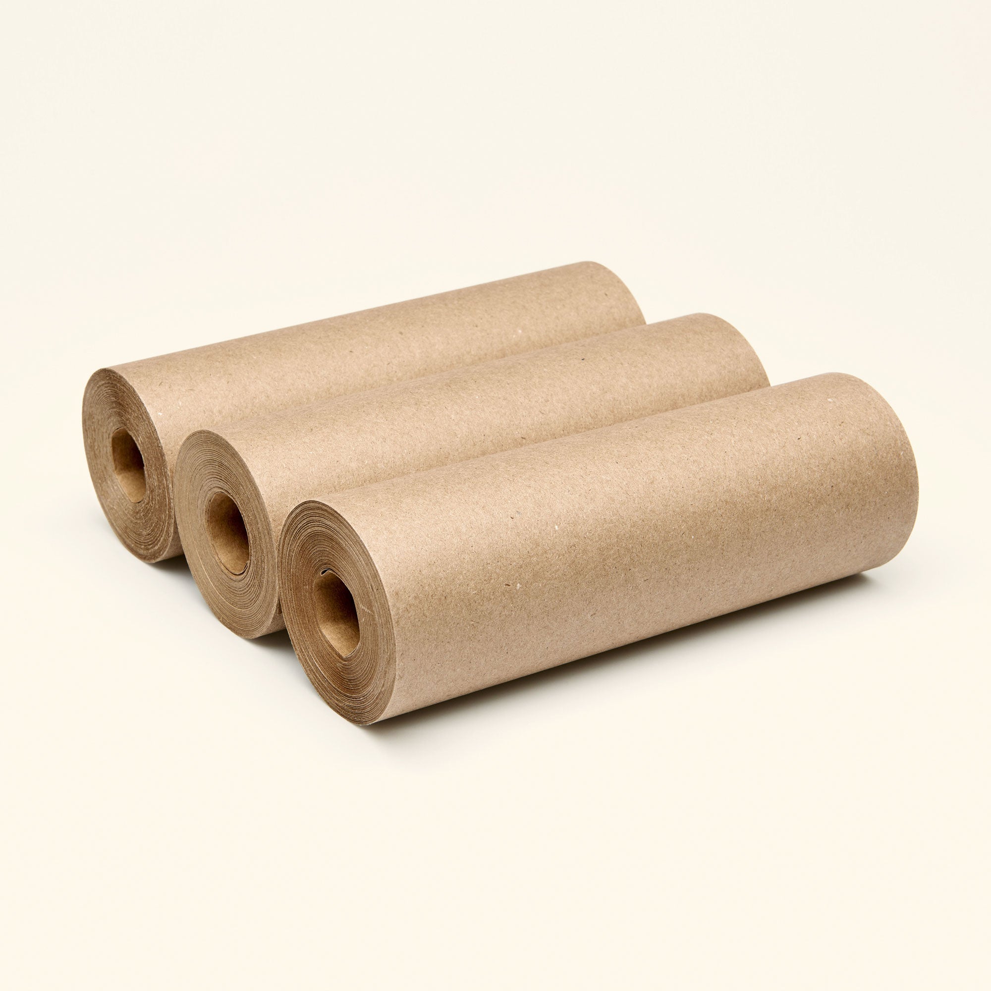 three kraft paper rolls side by side