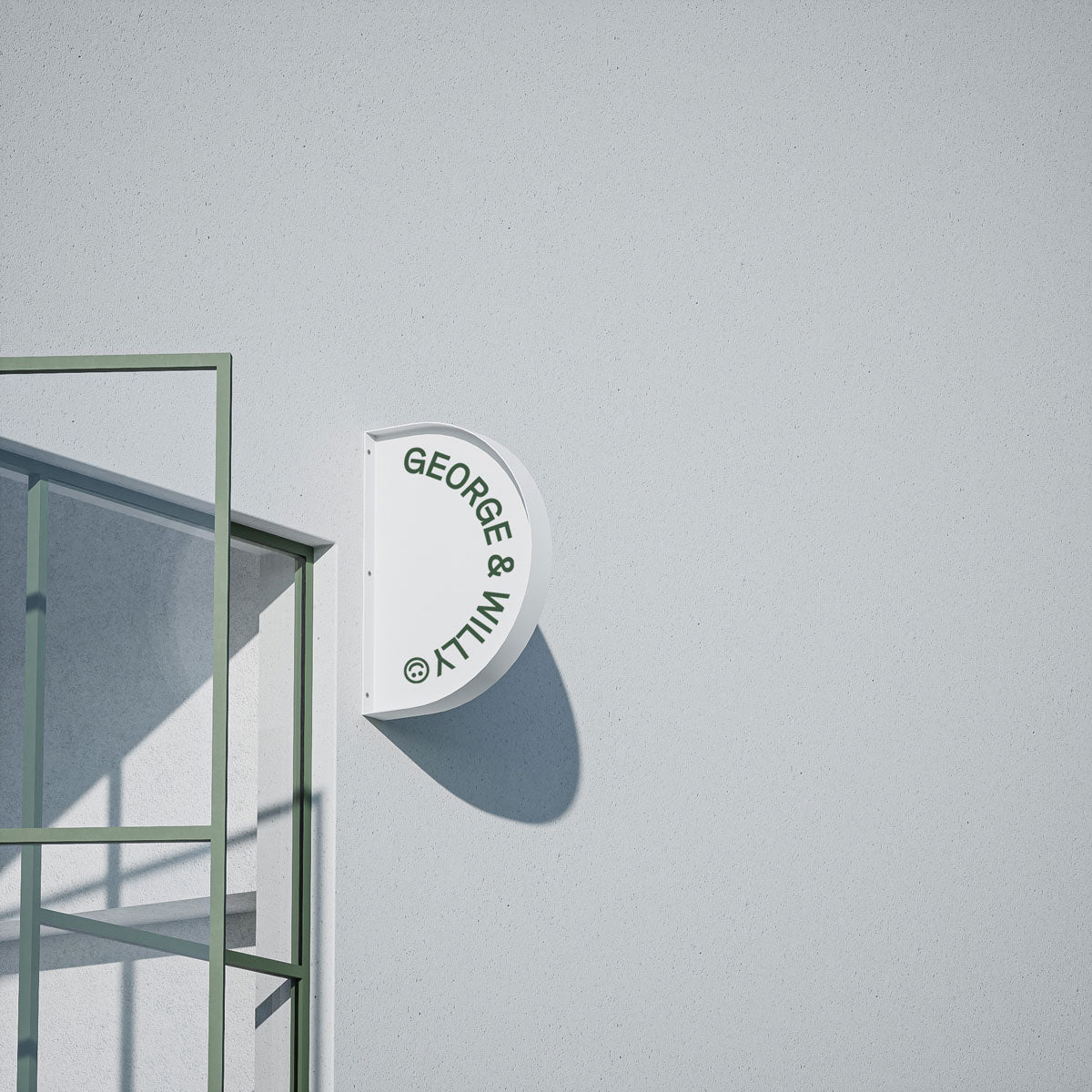 white half round wall-mounted store sign installed on a cement wall