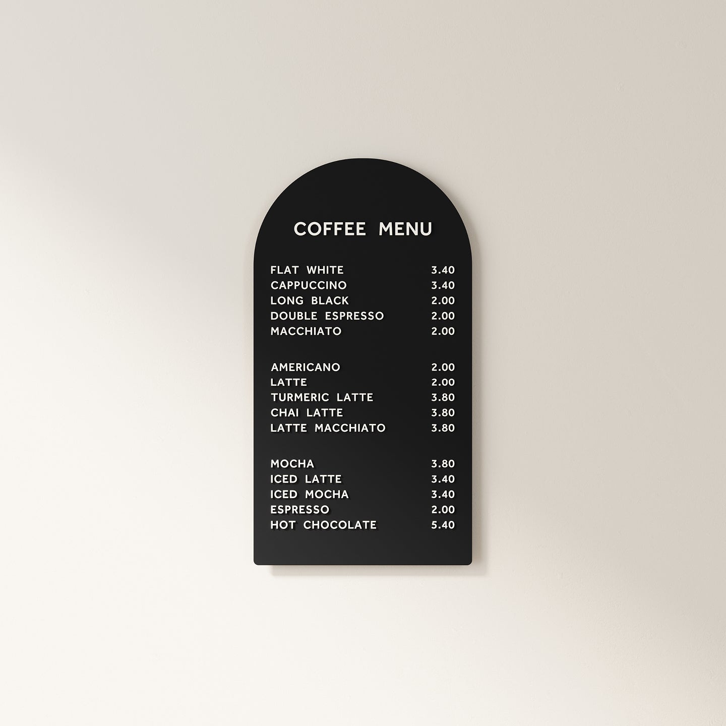 black arch menu display with white magnet letters