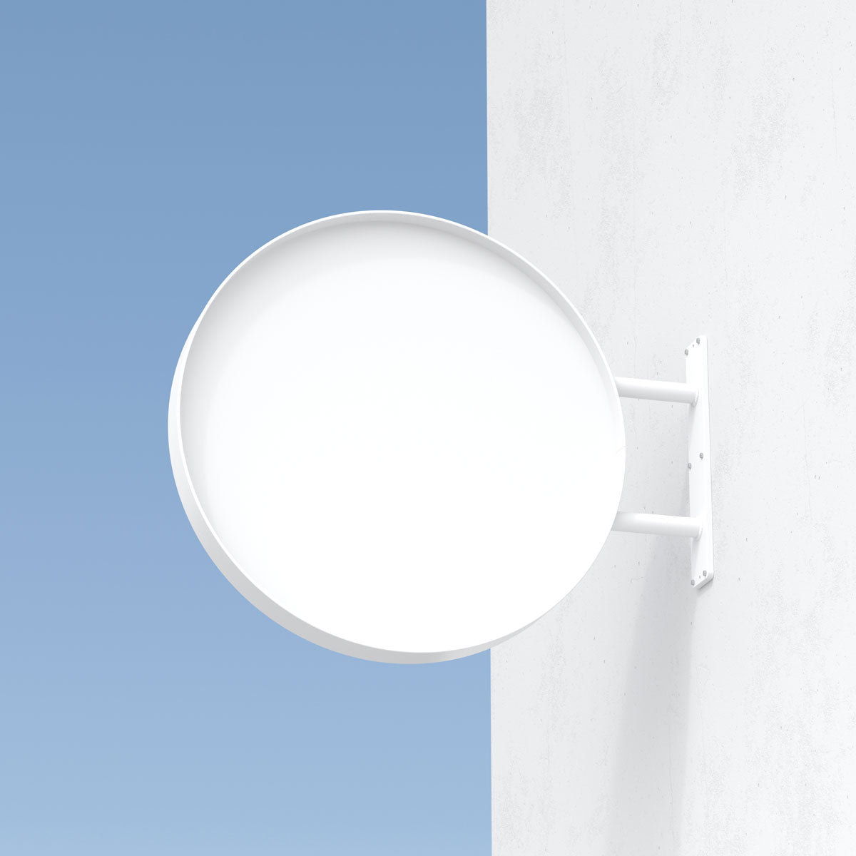 Minimal white round business sign mounted outdoors against blue sky