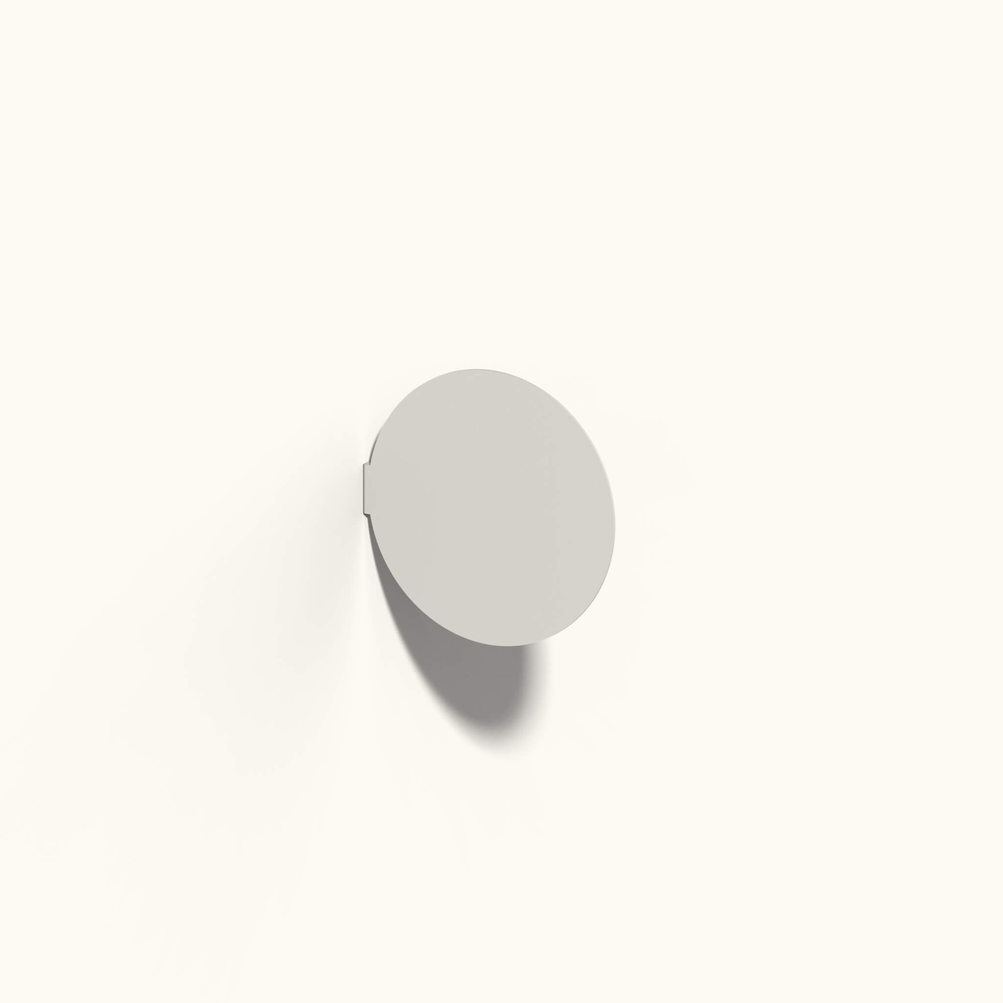 plain oat coloured circle blade wall sign
