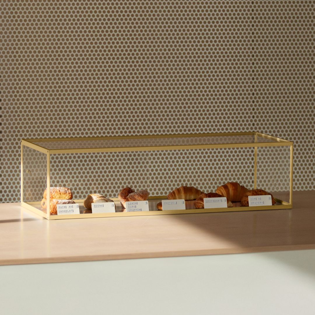 triple stacked brass bakery display cases