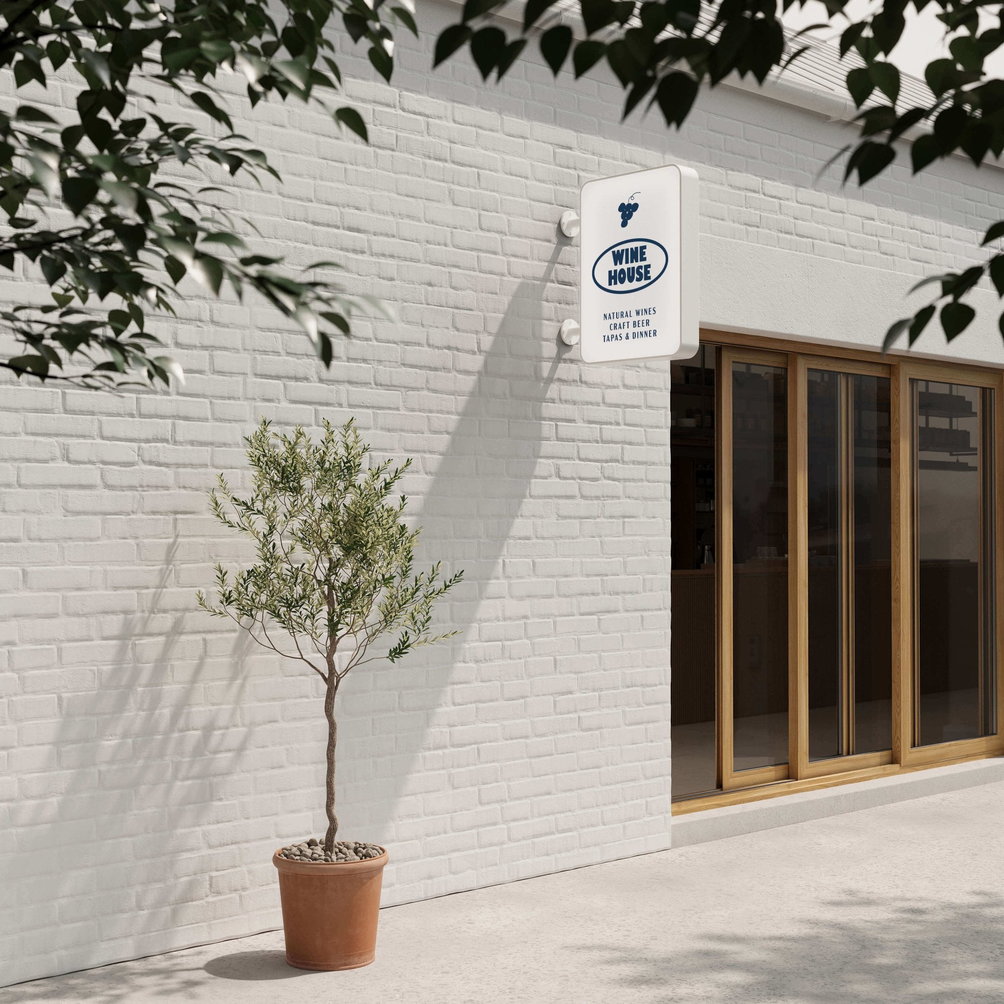 a daytime shot of the lit-up rectangle lightbox illuminated sign installed on a storefront