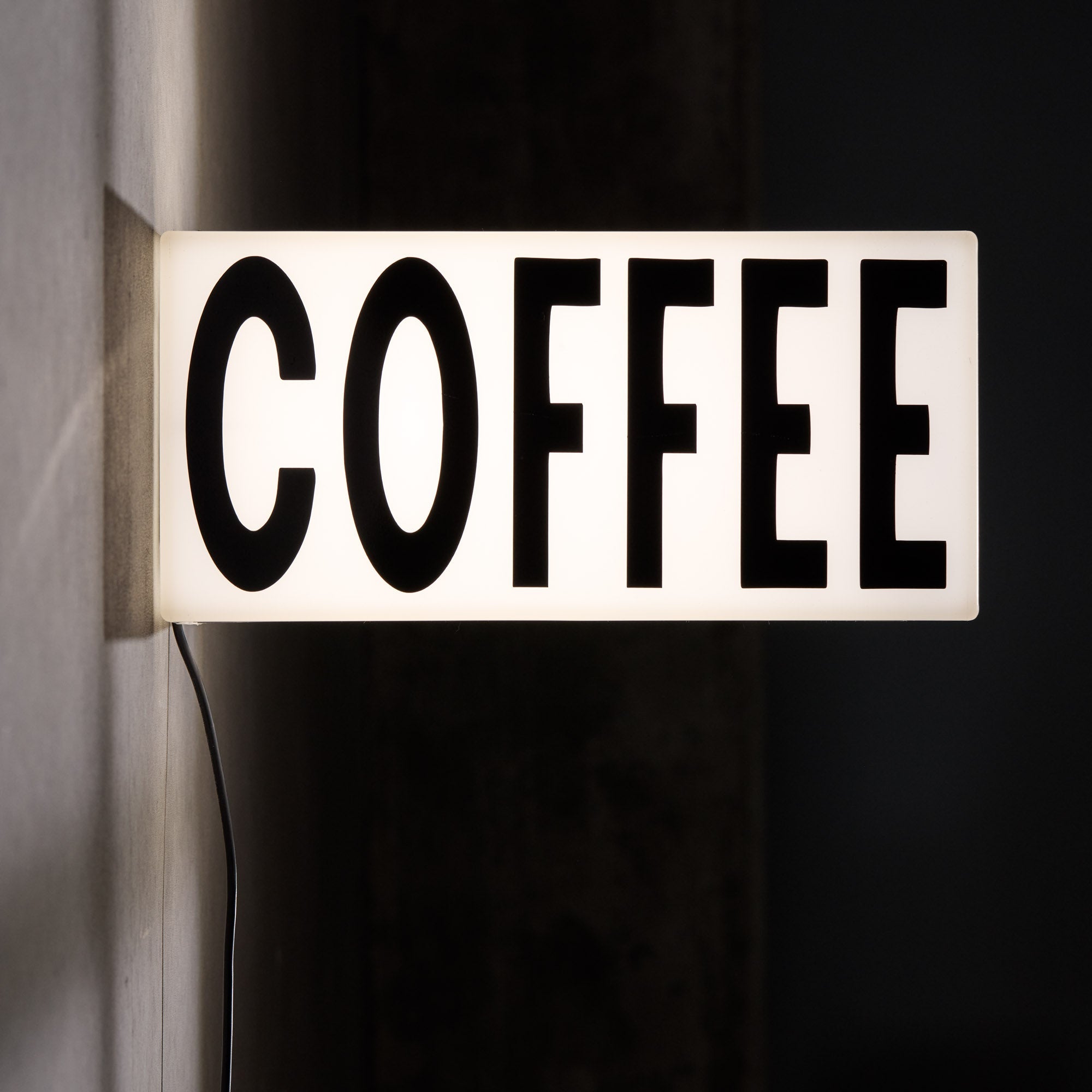 Flat side profile of plastic LED sign for coffee, highlighting slim rectangular silhouette