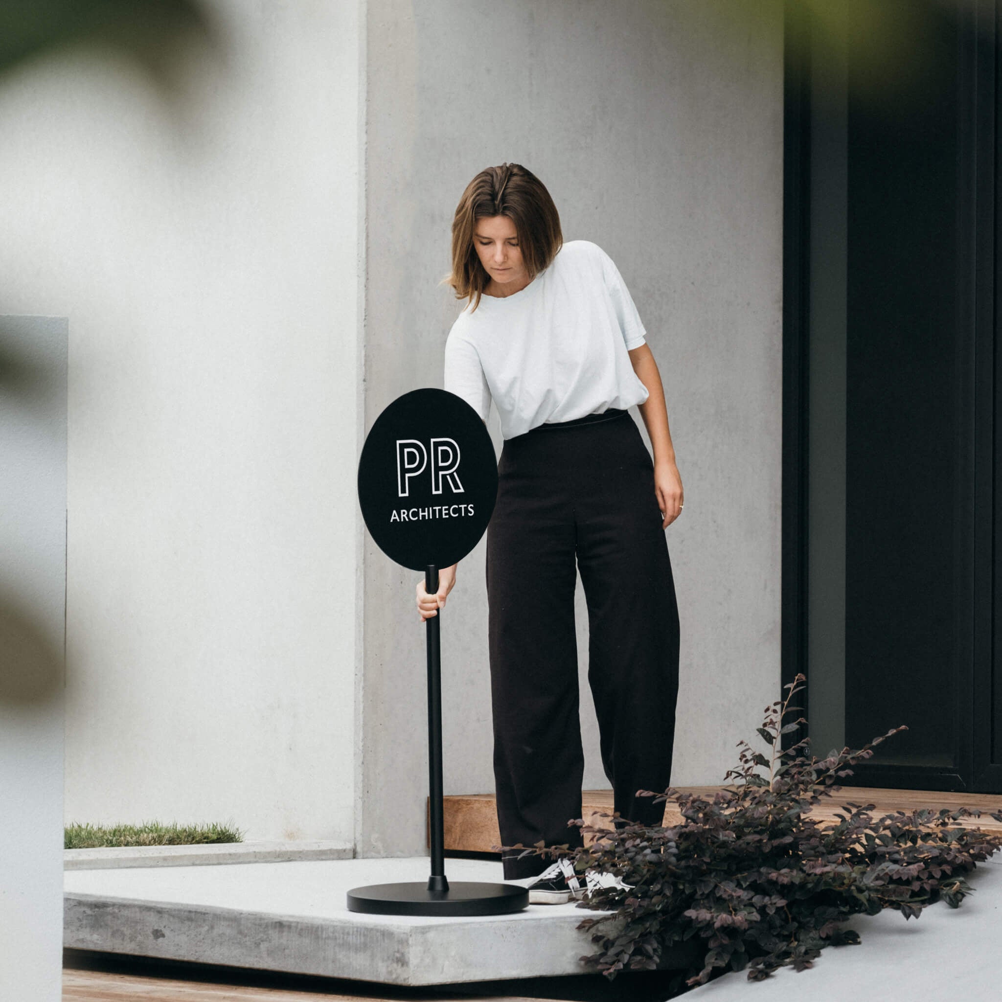 signs of advertising round sign outside on pavement